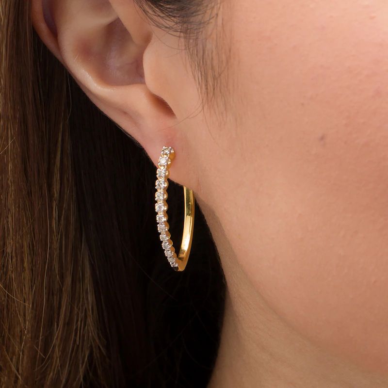1/2 CT. T.W. Diamond Oval Hoop Earrings in 10K Gold